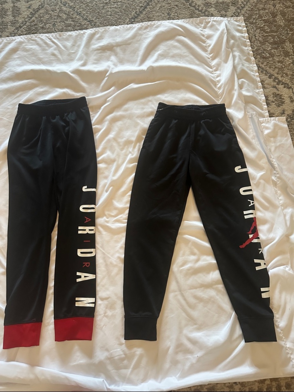 Jordan Kids Black Sweatpants with Red and White Logo